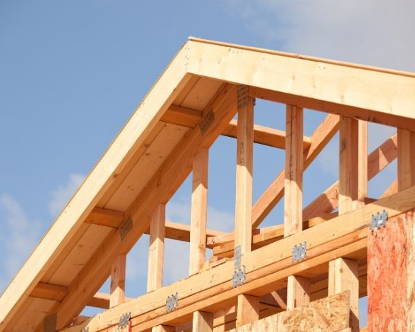 New house construction. Wooden frame with truss, post and beams. Generative AI